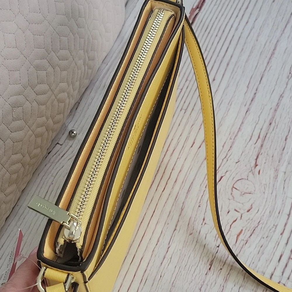 Kate Spade Butter Yellow Crossbody Bag with Minimalist Design NWT